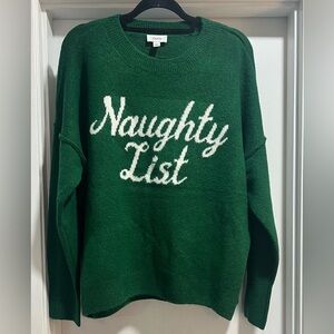 CeCe Green “Naughty List” sweater
